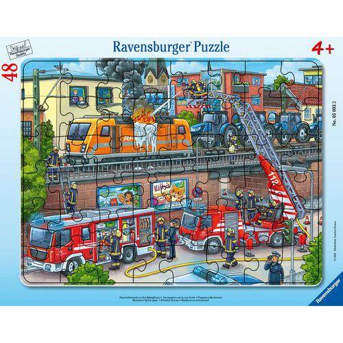 Illustration de : Puzzle pompiers voie ferrée - Ravensburger