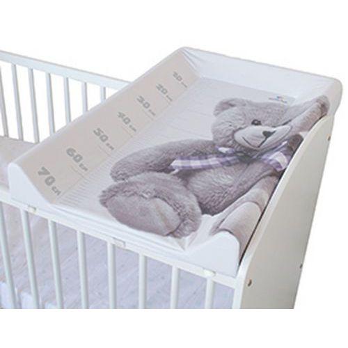 Illustration de : Plan à langer matelas intégré