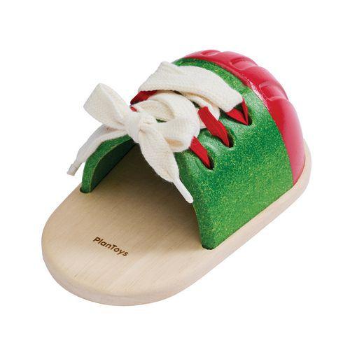 Illustration de : Grande chaussure à lacer en bois taille réelle - Plan Toys