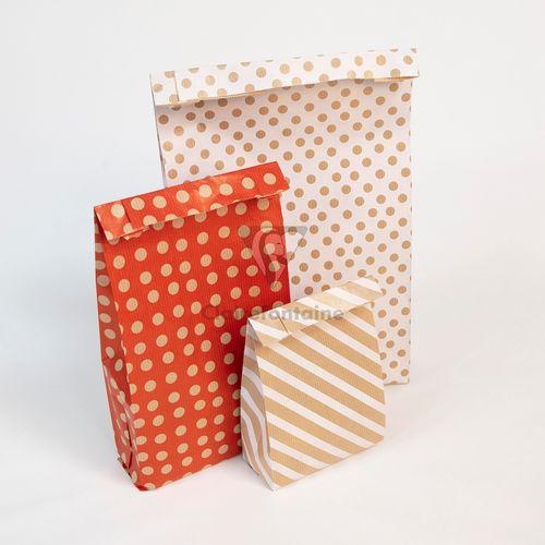 Illustration de : Sachet 50 pochettes kraft 15x31+6cm Pois fond rouge - Clairefontaine